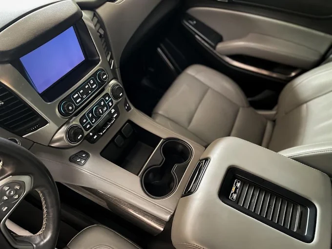 Spotless center console and light leather seats