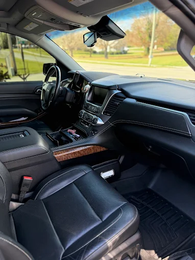 Clean black leather interior of a Chevy Tahoe