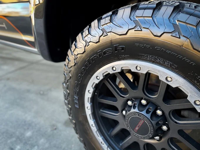 Close-up of a dressed BFGoodrich tire and black wheel